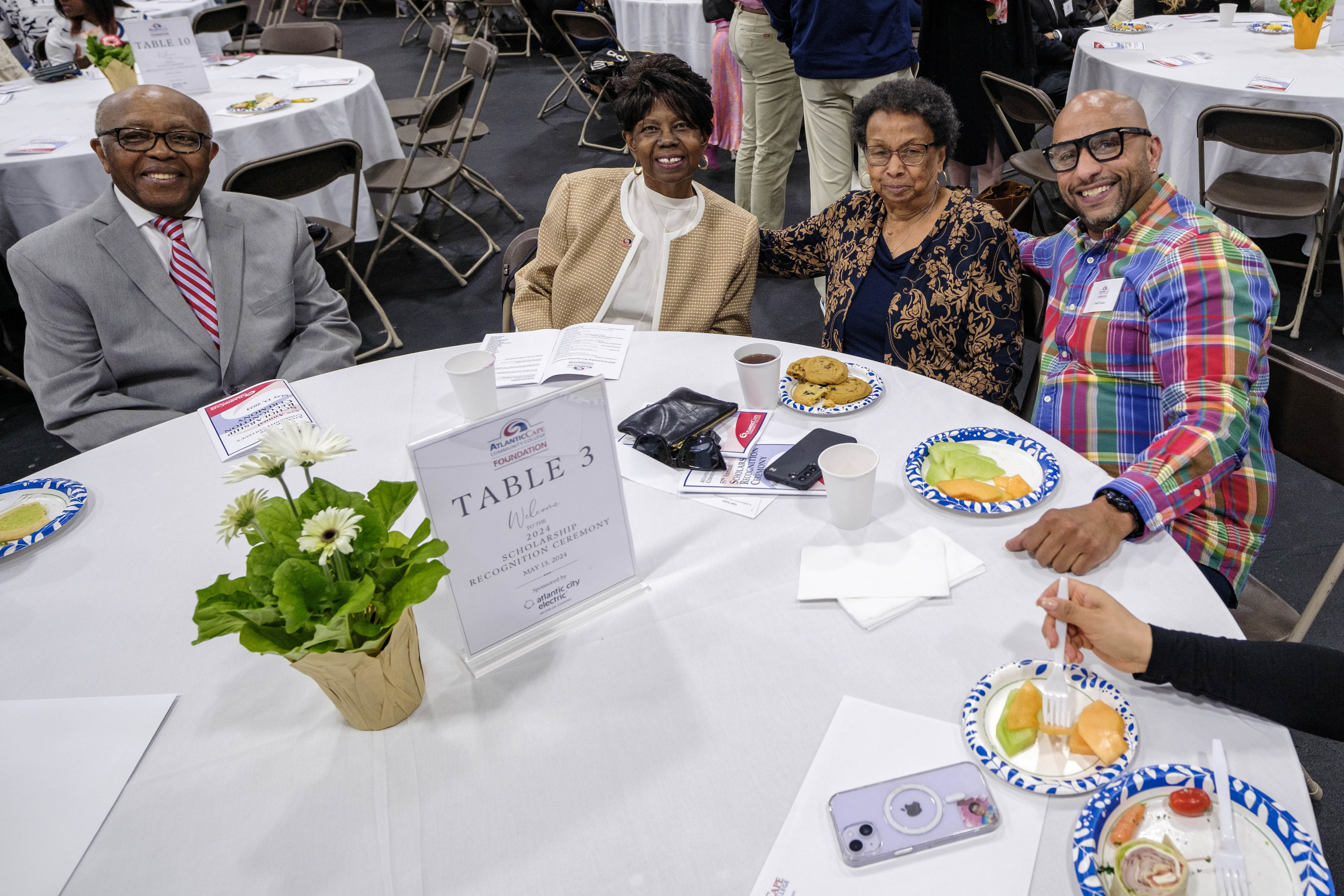 Atlantic Cape President Dr. Barbara at a table with her husband and guests
