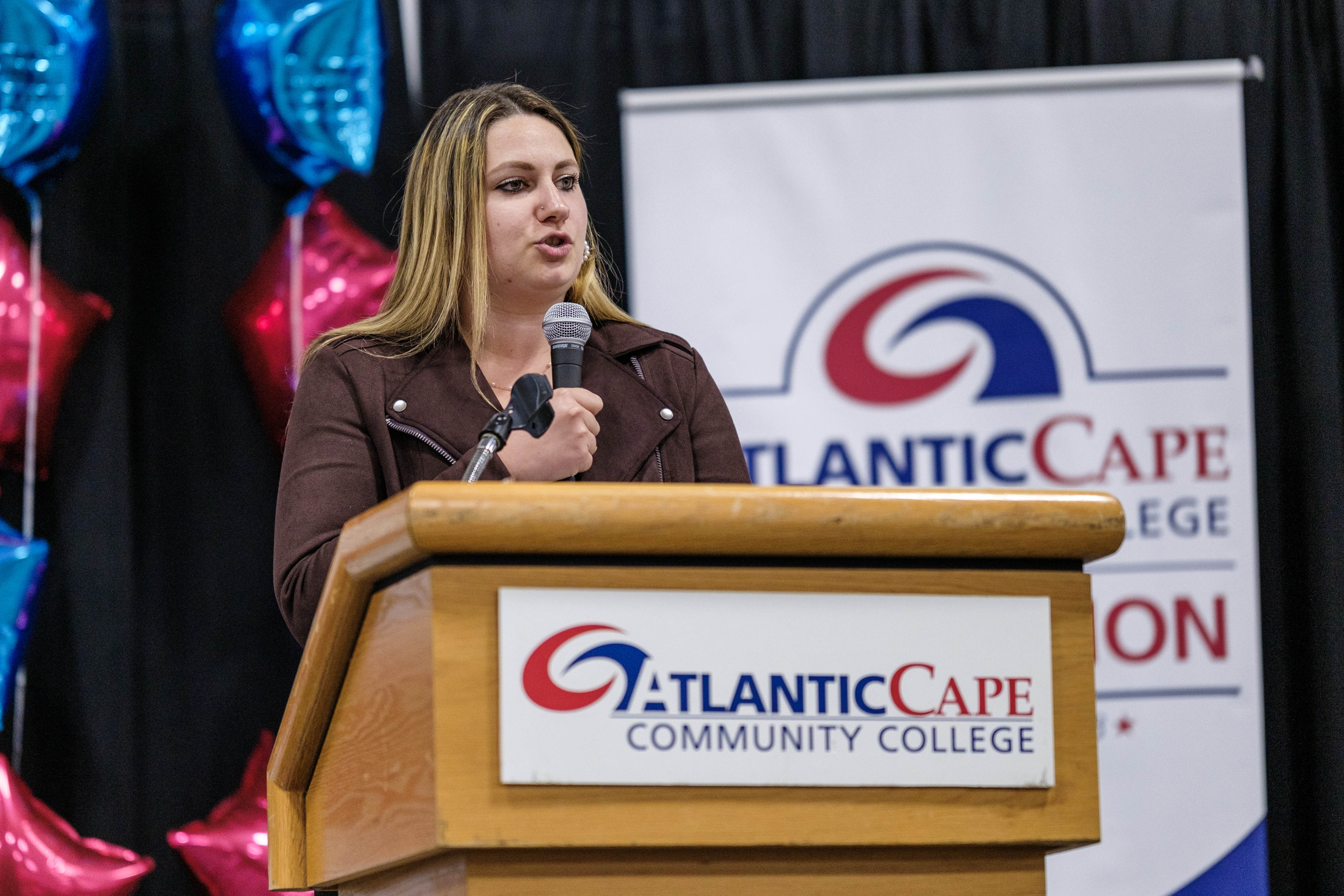 Atlantic Cape student Jessica White speaks to the audience