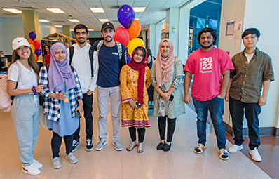 Student gathered in the hallway in the student center,