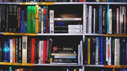a bookshelf full of books
