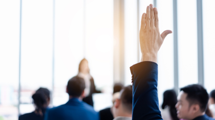 picture of someone raising their hand