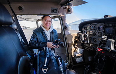 Student in the cockpit of an airplane