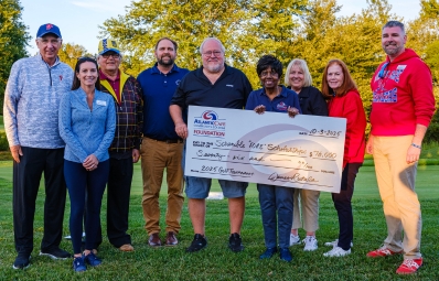 check presentation at 2025 golf outing