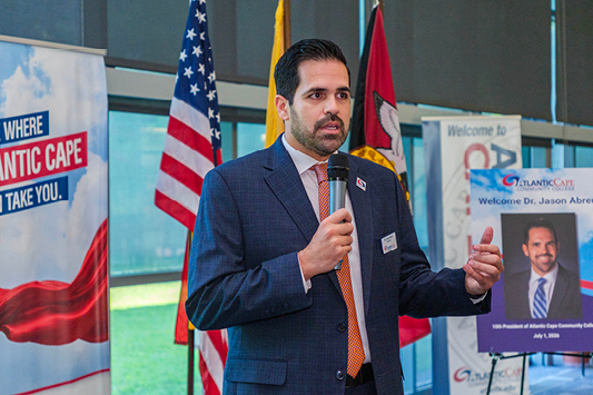 Atlantic Cape President Dr. Jason Abreu speaks to members of the College community during a campus event.