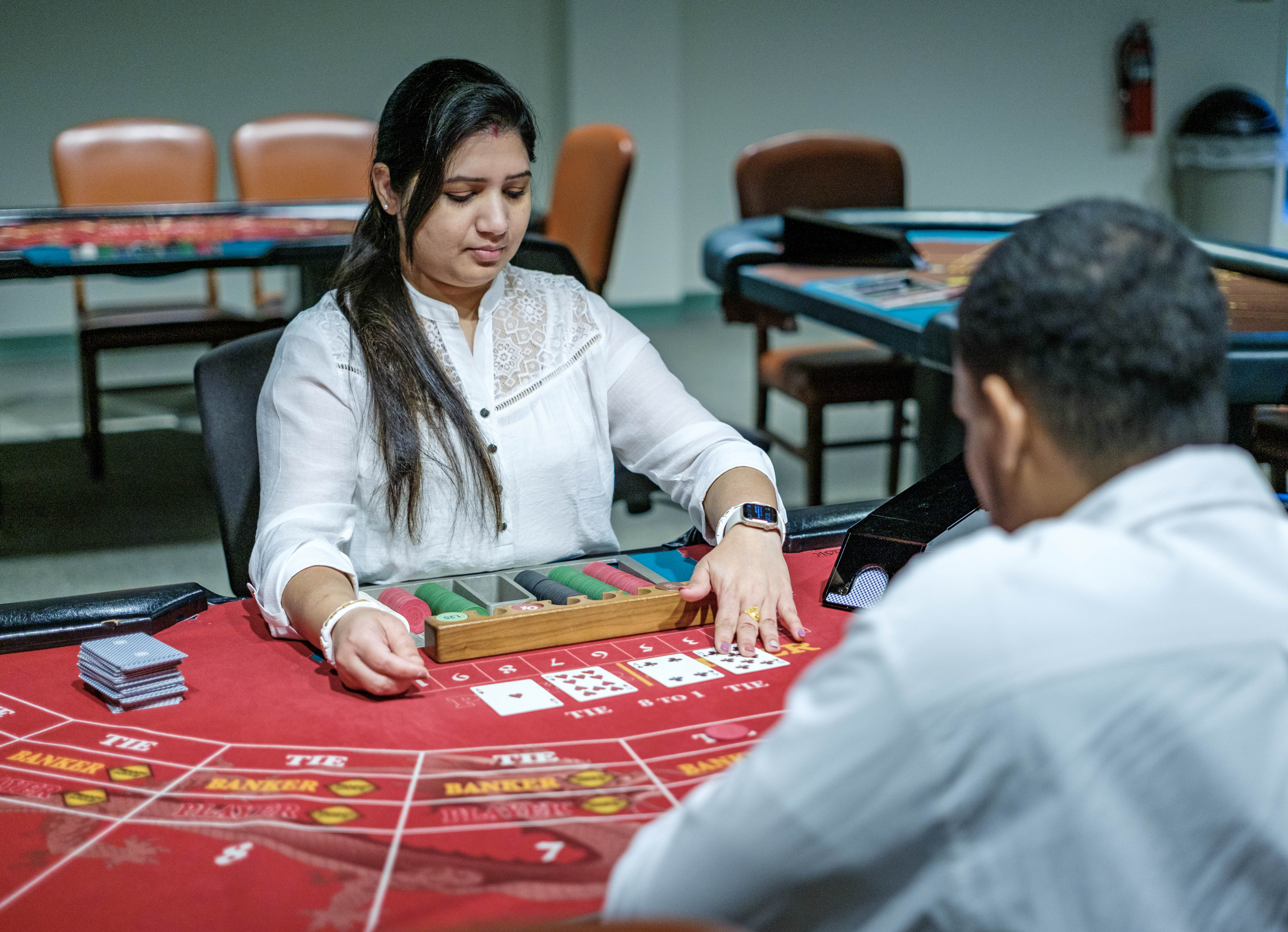 student practicing card dealing