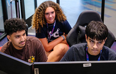 Students in front of computer in the Innovation Center.