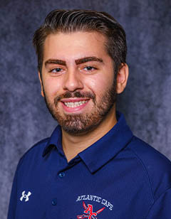 Assistant Coach Joseph Schipsi