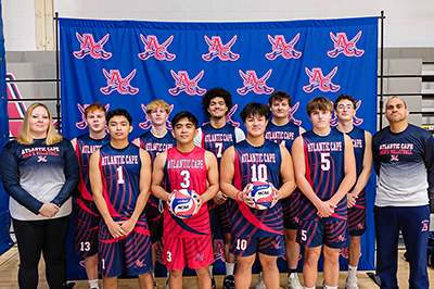 Men's Volleyball 2026 team and coaches group photo.
