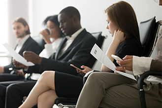 people sitting in an office waiting area