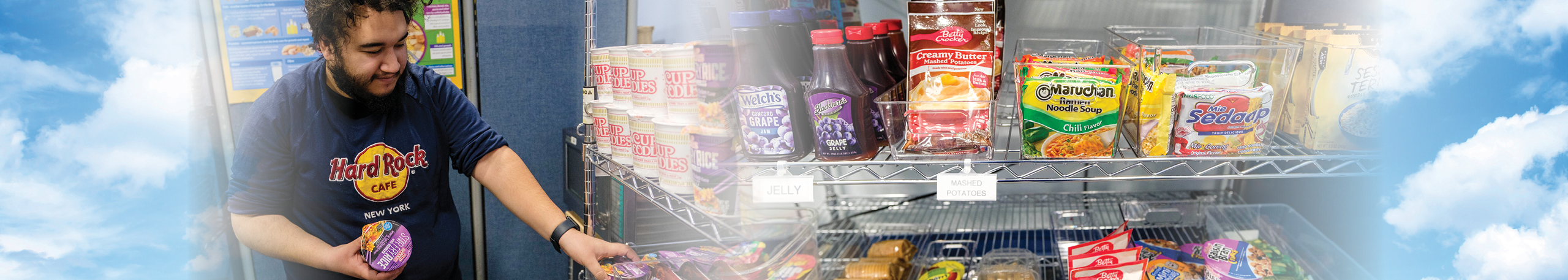 Food Pantry worker with food items