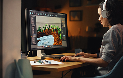 Person at computer designing games