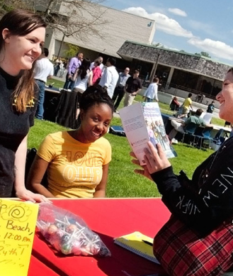 female students at campus fair market