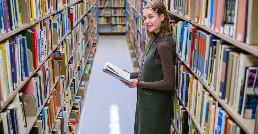 Atlantic Cape alumna Soleil Yakita in the William Spangler Library
