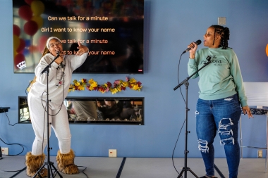 First-Gen students enjoying karaoke