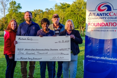 Mullock Family Endowment check presentation