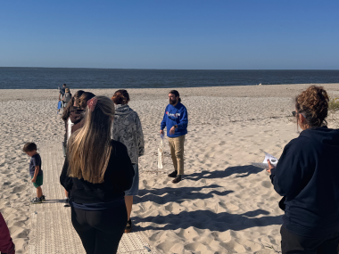 Professor Rich Perello leads guests on the beachcombing walk