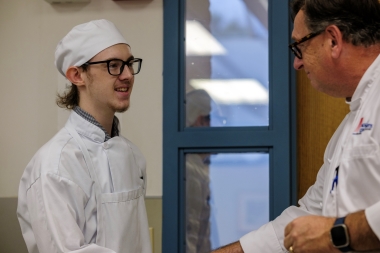 Ryan Somers is congratulated by Chef Joseph Sheridan