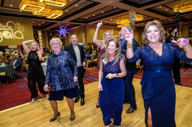 attendees dancing and having a good time on the dance floor