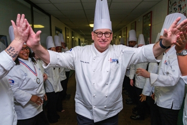 Chef Joseph Sheridan celebrates with his graduates
