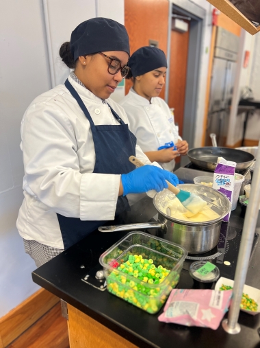 Amy and Danna Jimenez cooking