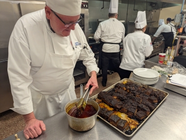 ACA student prepares veal brisket