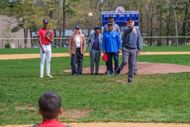 Alumnus Stephen Nehmad throws out the first pitch