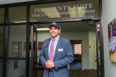 Dr. Jason Abreu outside his Presidential Suite 