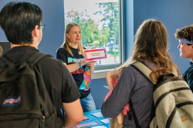 students listening to mental health advice