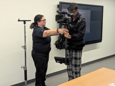 High school student tries on the steadicam