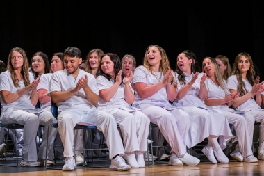 Nursing graduates on the stage