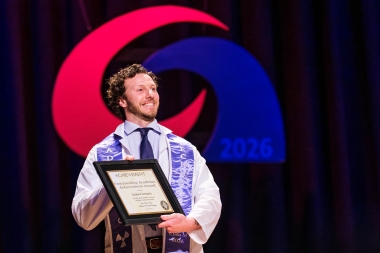 student receives his certificate of completion