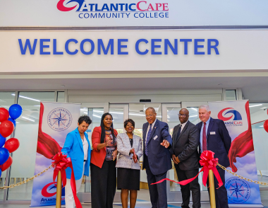Dr. Gaba helps cut the ribbon on the new One-Stop Welcome Center