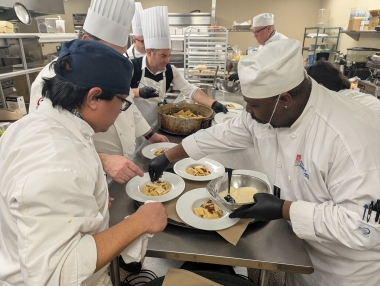 ACA students prepare pasta dishes