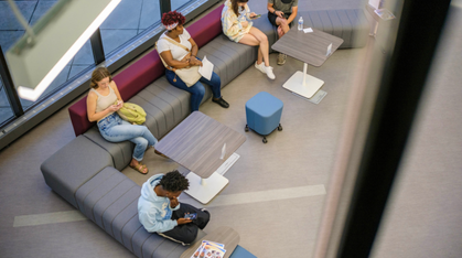 students sitting on a couch