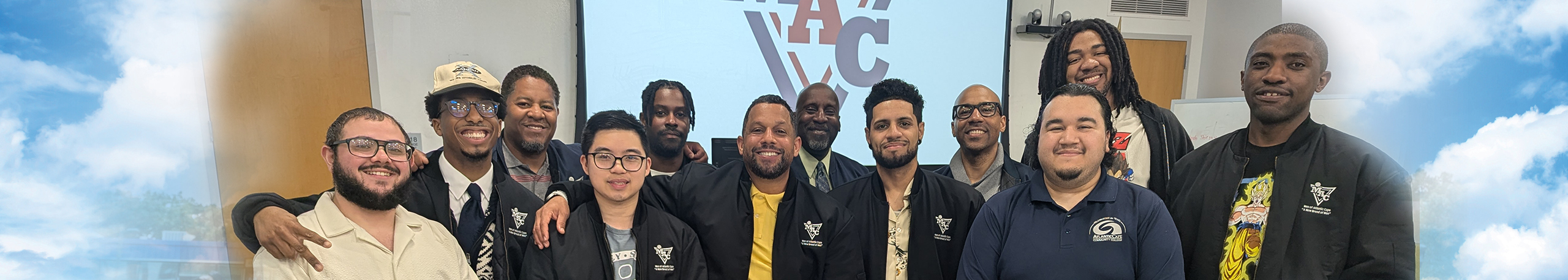 Men of Atlantic Cape (MAC) participants and staff pose together for a group photograph at Atlantic Cape Community College.