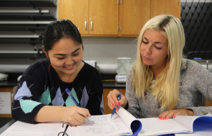 two students helping each other tutoring