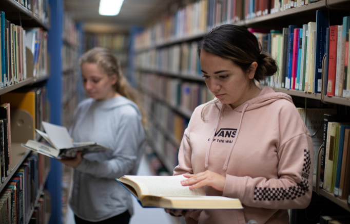 two students in the library