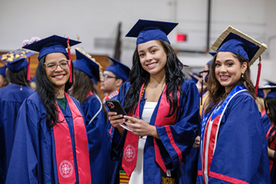 Students in cap and gowns.