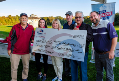 Check presentation at the 2022 Annual Golf Tournament