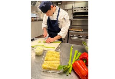 Culinary student preparing his ingredients