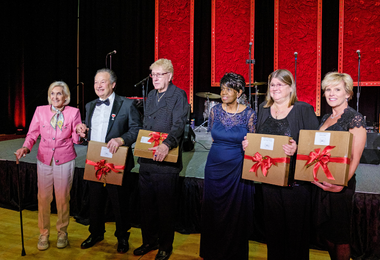 Local icons are honored and pose for photo with Atlantic Cape President Dr. Barbara Gaba