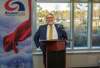 Dr Michael Dryer speaks at the signing ceremony