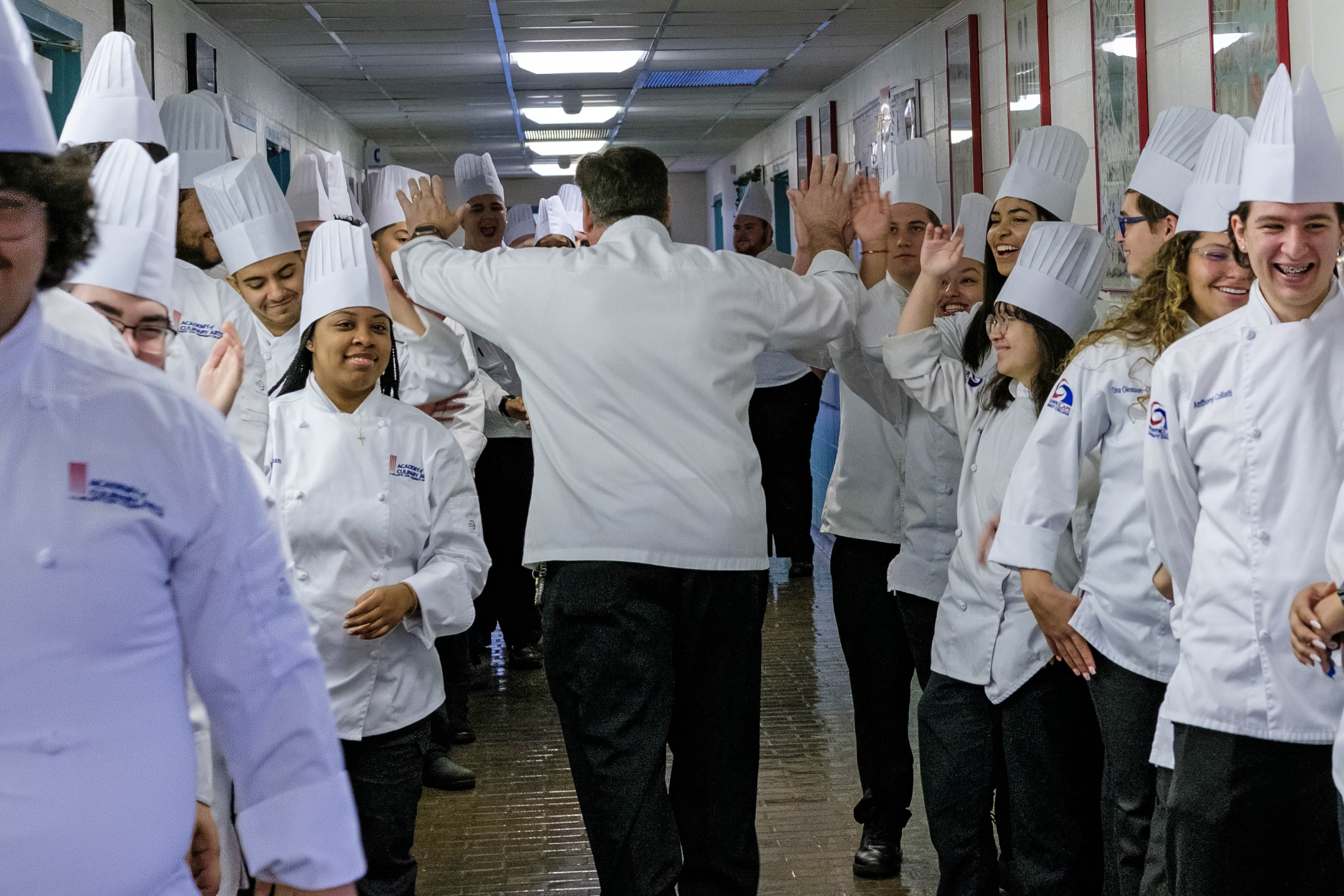 Director Chef Joseph Sheridan congratulates his graduates