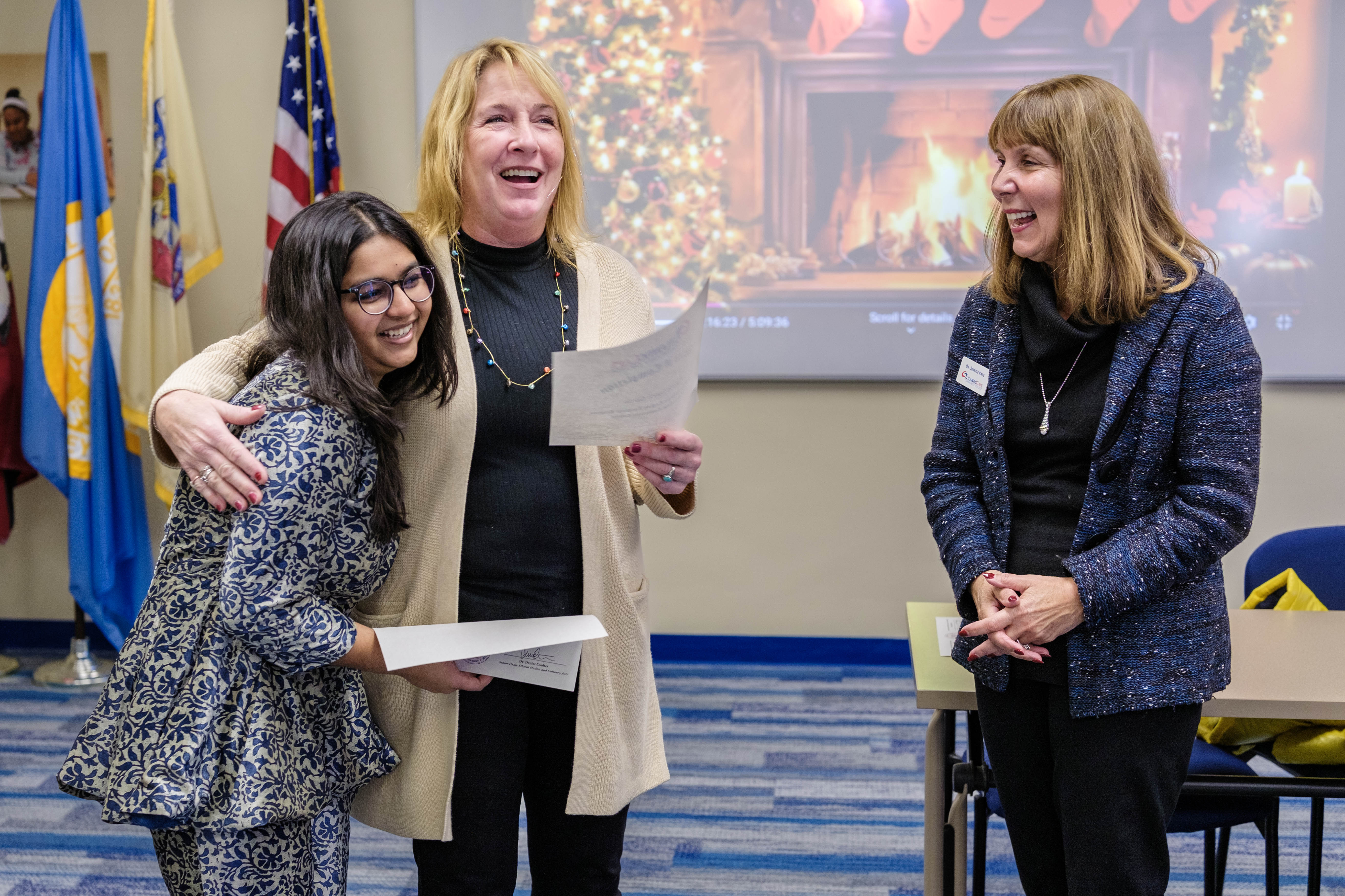 student receives her certificate of completion