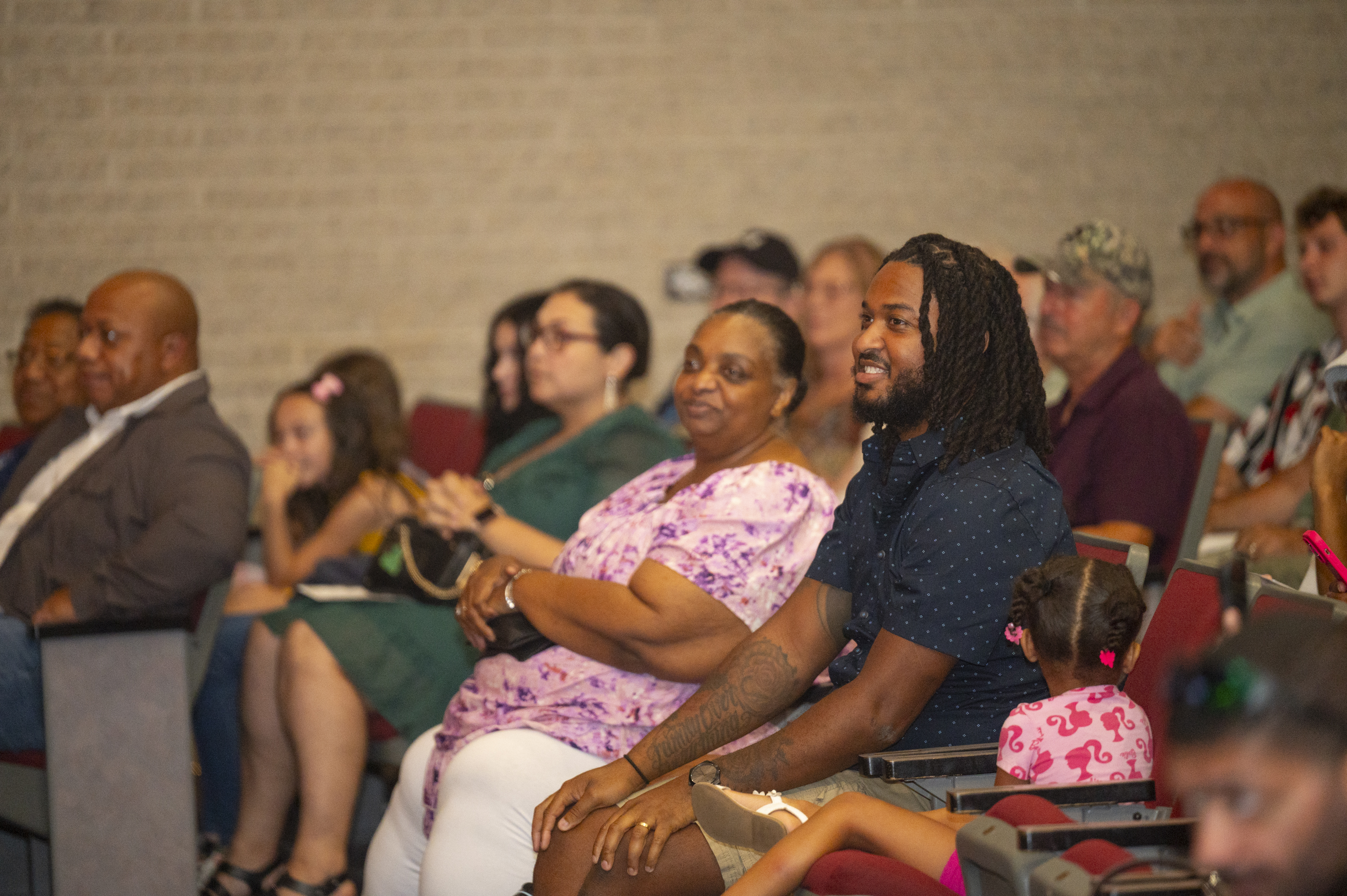 Friends and family cheer on the graduates