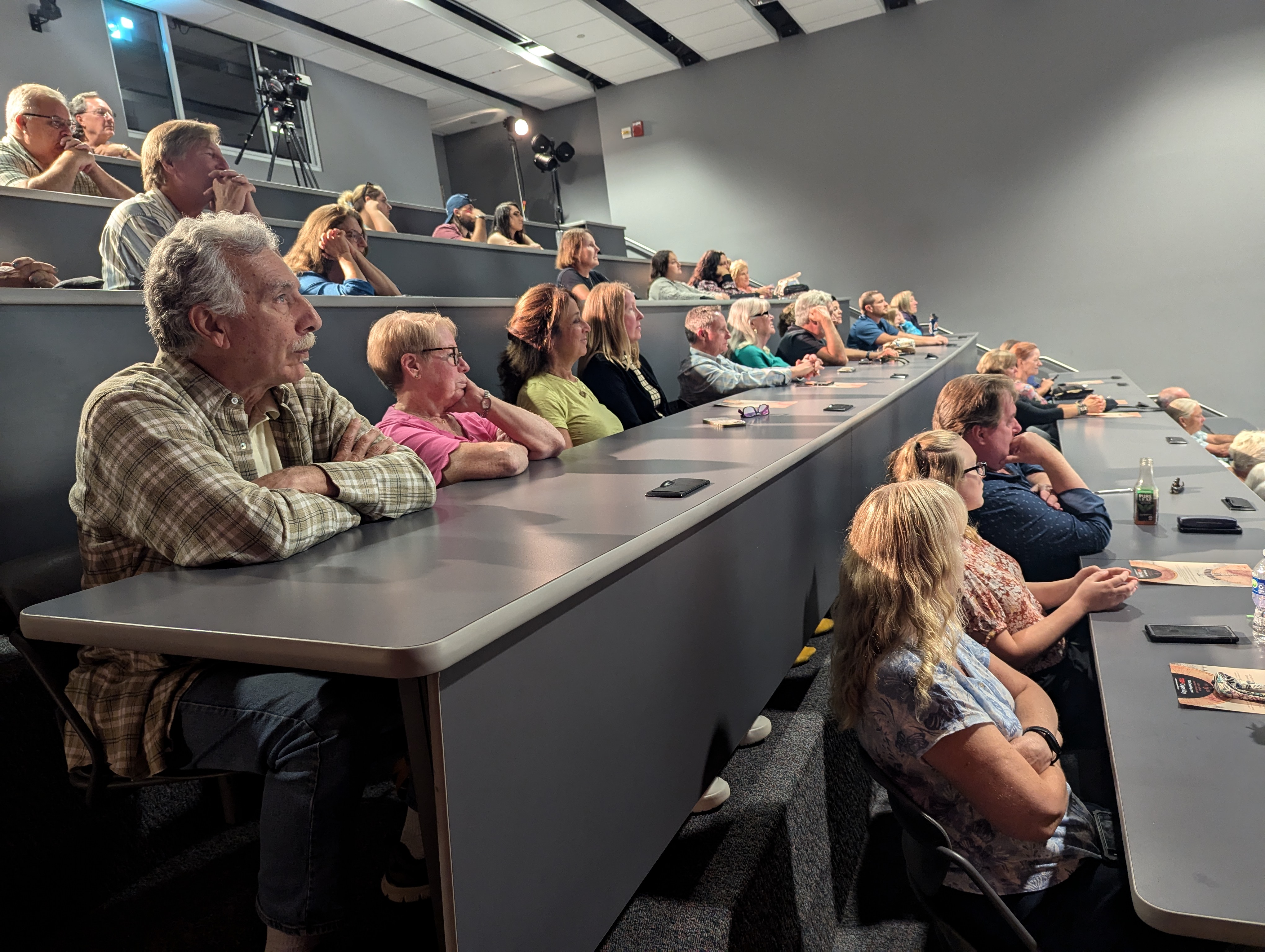 Attendees listening to Dr Burcher speak