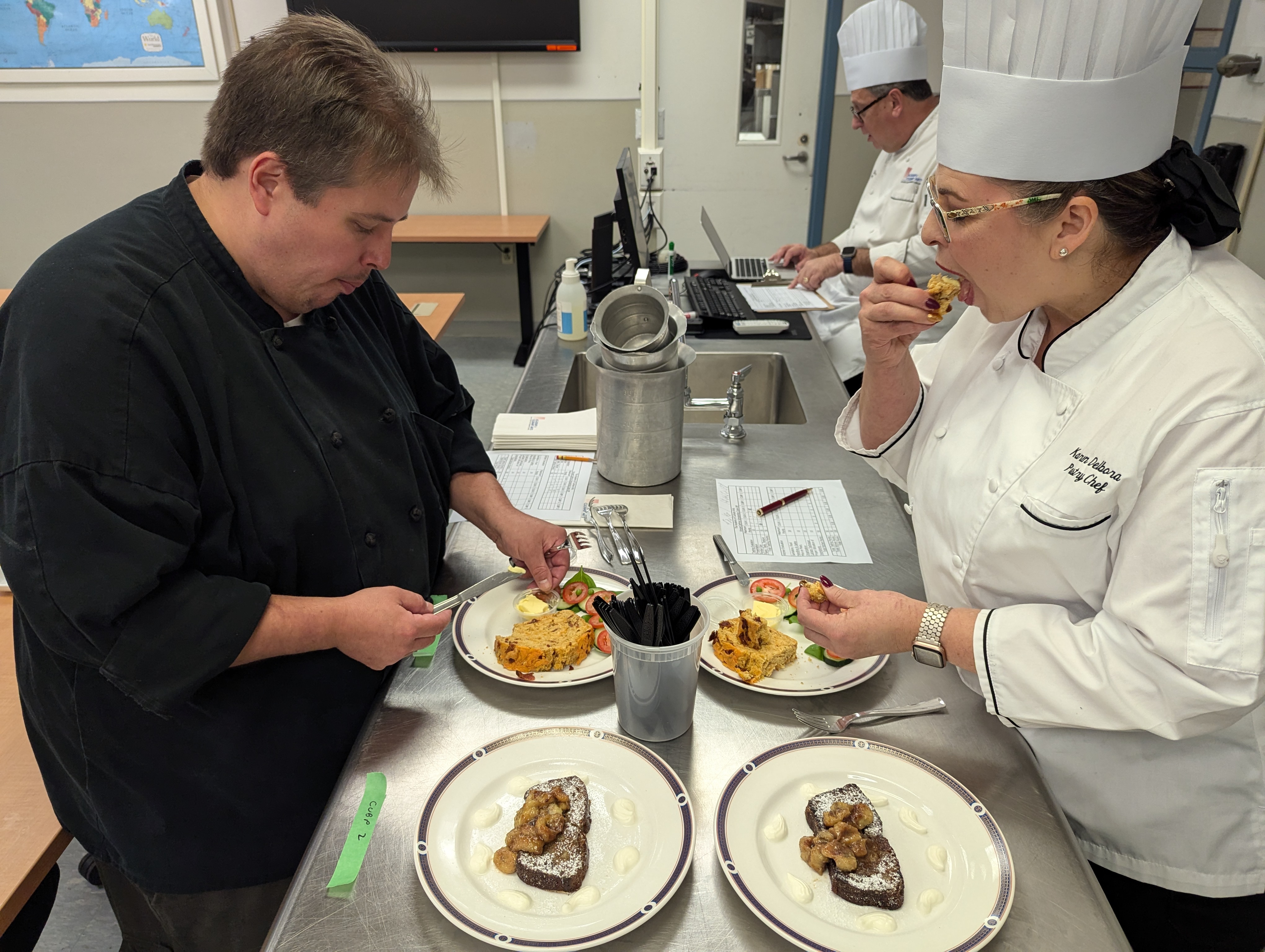 Judges taste testing during DeFinis competition