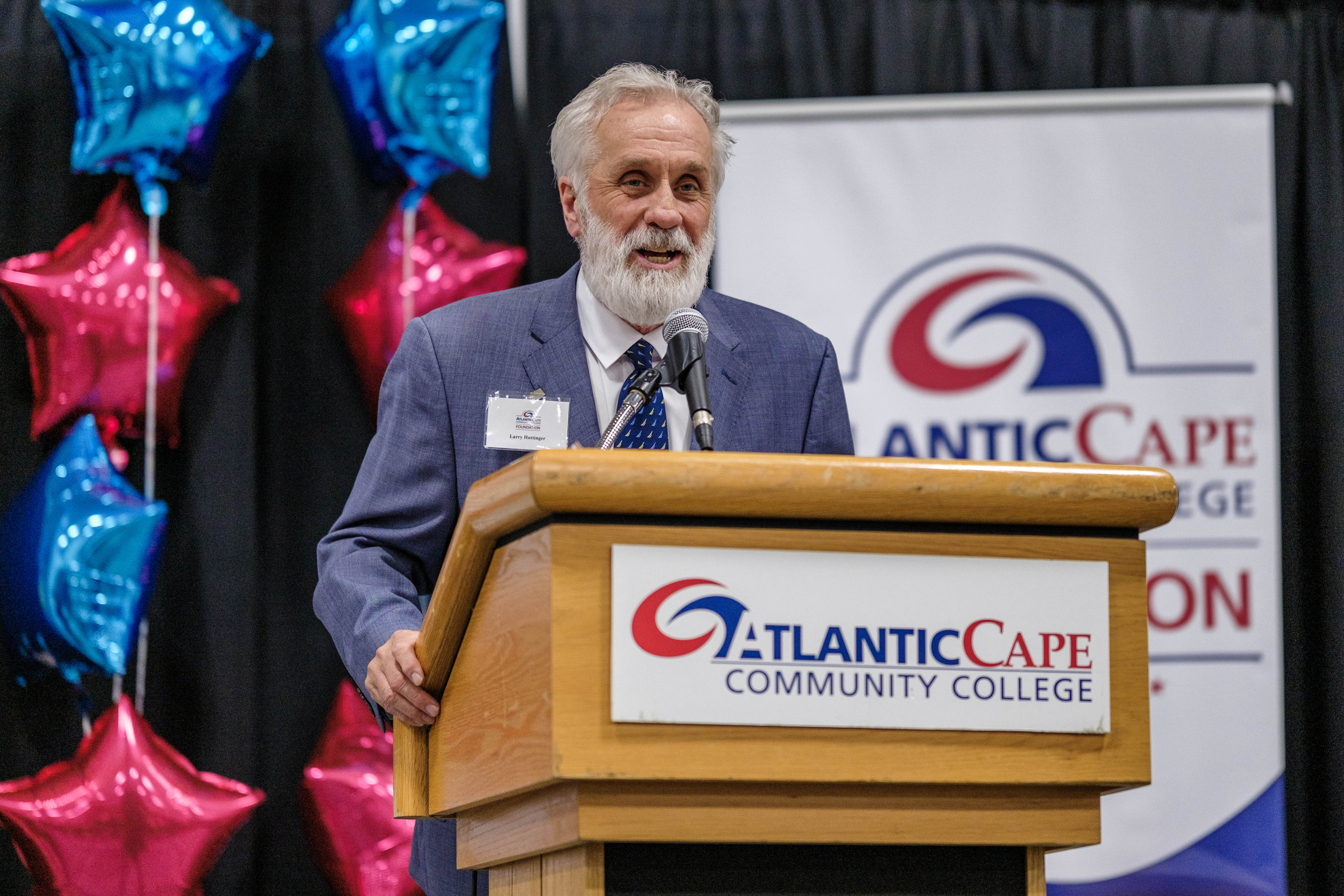 Donor Larry Huttinger speaks to the audience