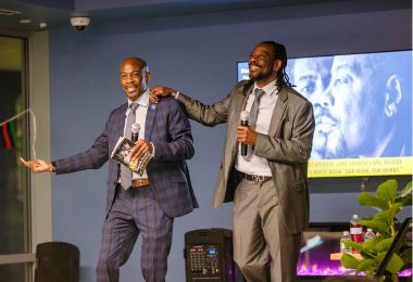 The Twin Poets during an expressive spoken word performance