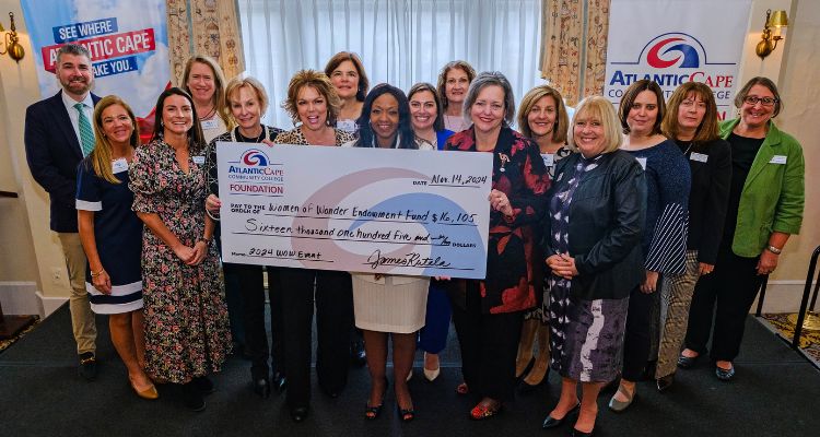 check presentation at 2024 Women of Wonder event